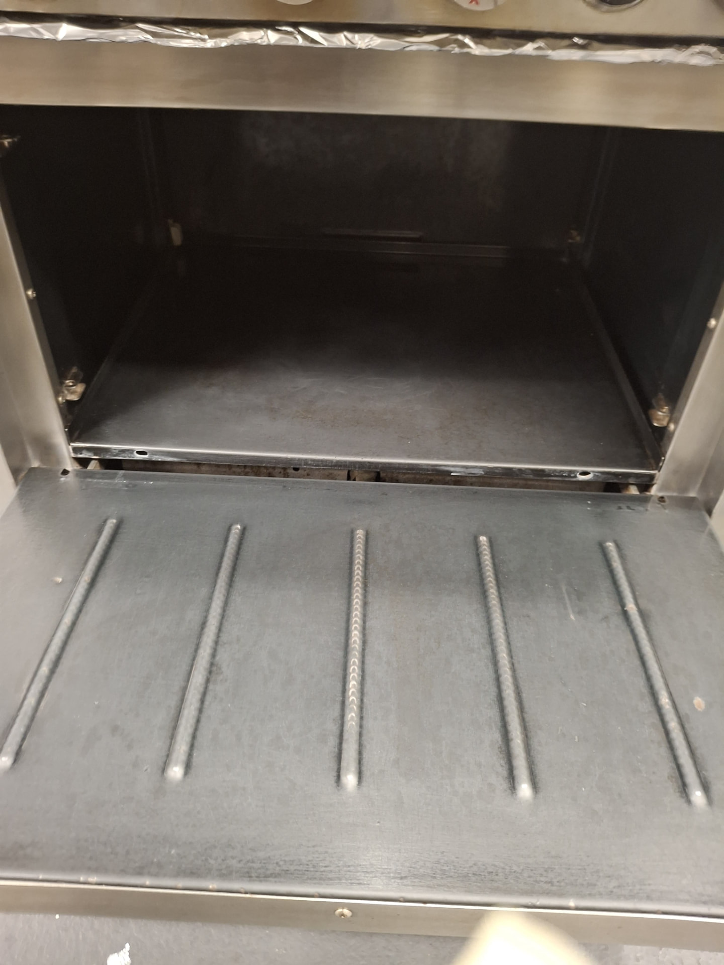 The same commercial oven interior clean and grease-free after Ledian's Cleaning Services