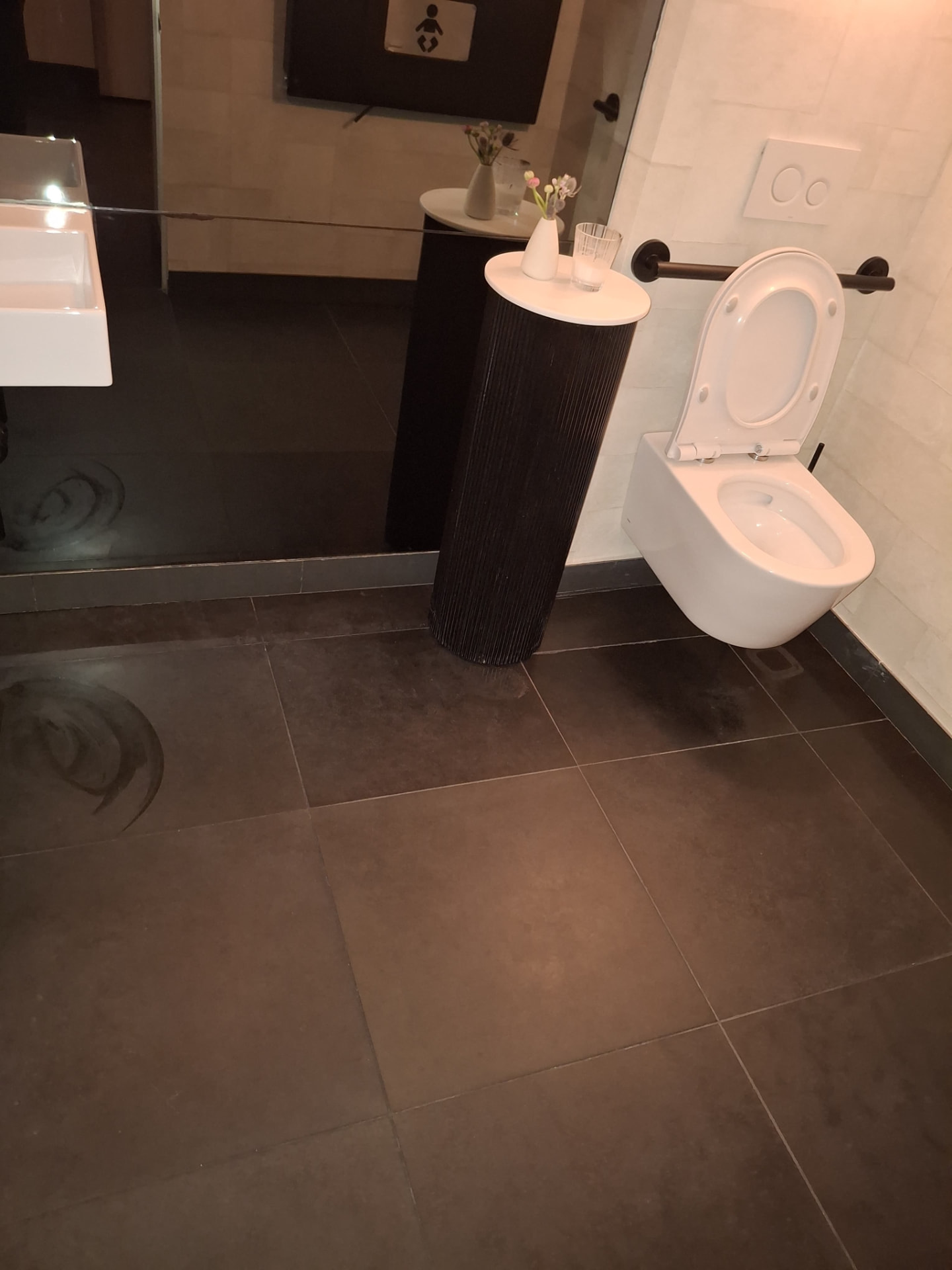 Clean commercial restroom with polished sink counter and mirrors — Ledian's Cleaning Services