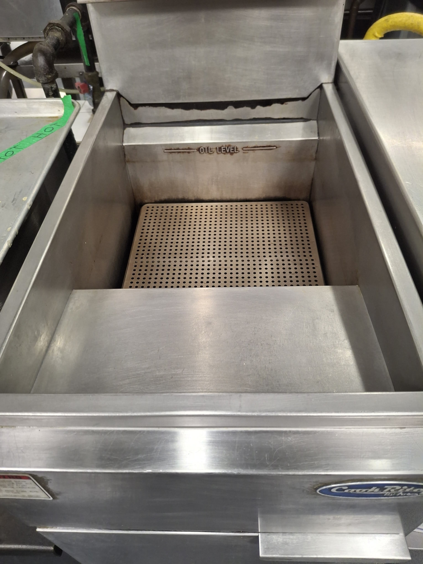 The same commercial deep fryer well drained, degreased and clean after Ledian's Cleaning Services